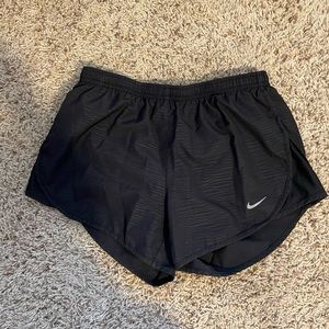 Black Nike running shorts